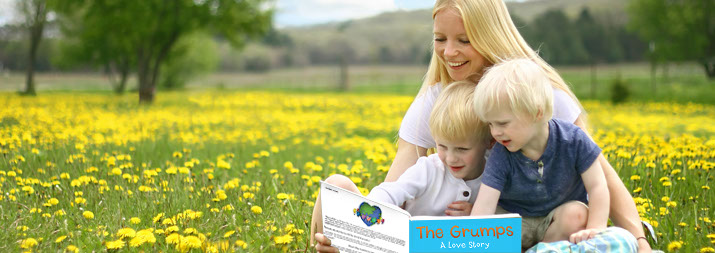 mom reading a book to her children